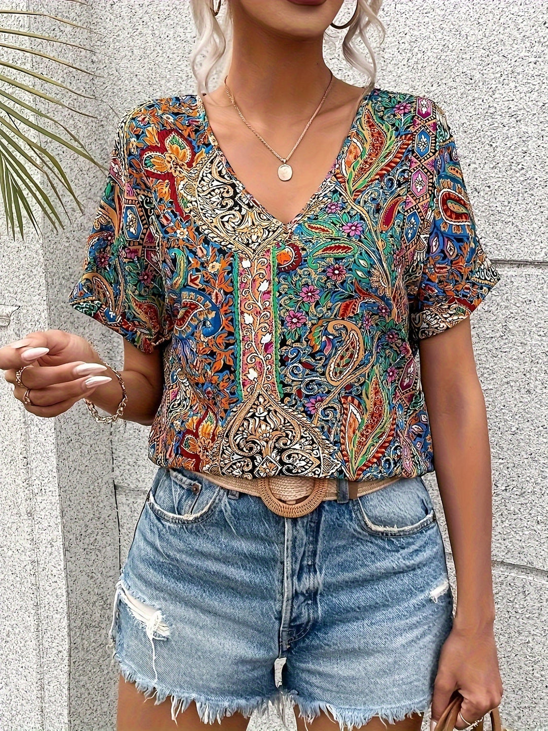 Blusa elegante con estampado cachemir y cuello en V - Van Moreau Utrecht