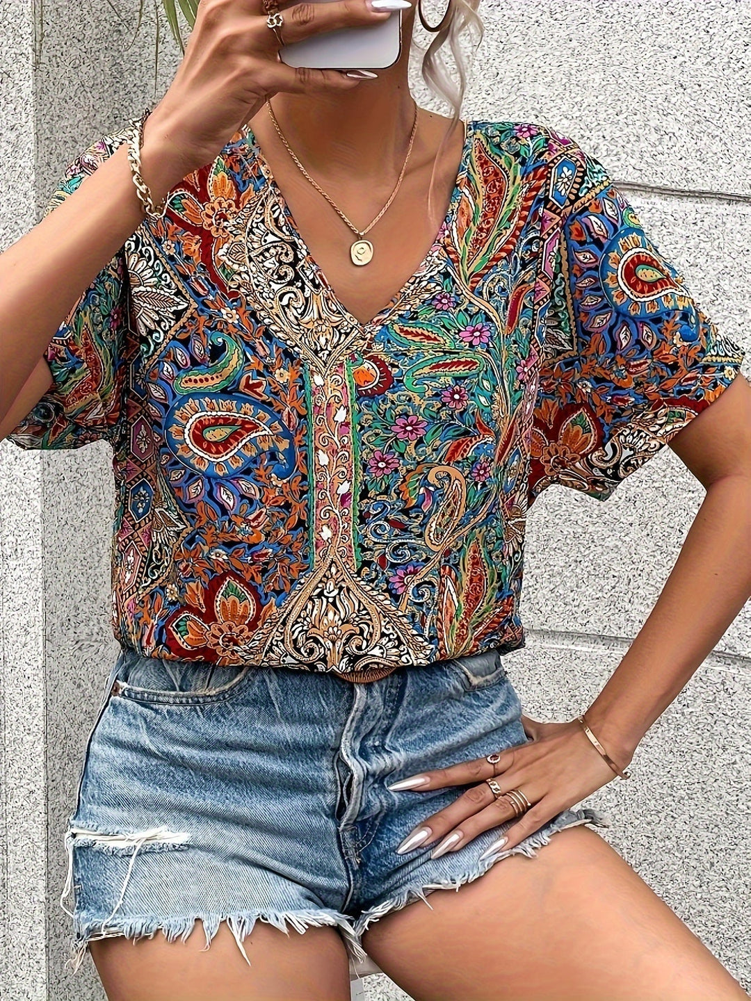 Blusa elegante con estampado cachemir y cuello en V - Van Moreau Utrecht